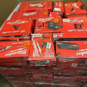 Pallet of Milwaukee M18 Fuel power tools shrink wrapped in warehouse.